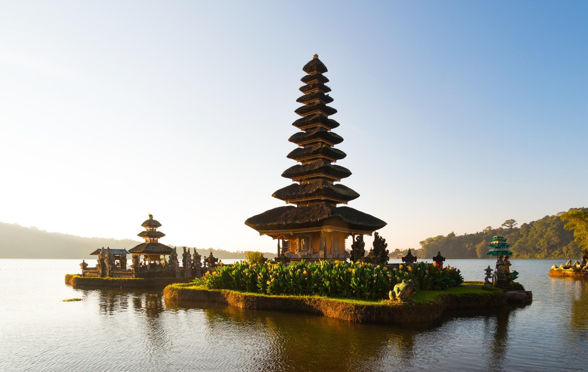 Beautiful travel destination - Bali temple with misty mountains